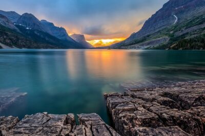 Natuur schilderij van zonsondergang bij meer