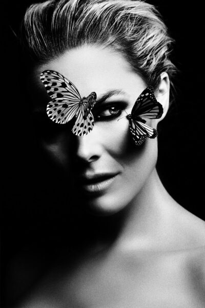 Unieke wanddecoratie van portret met vlinders